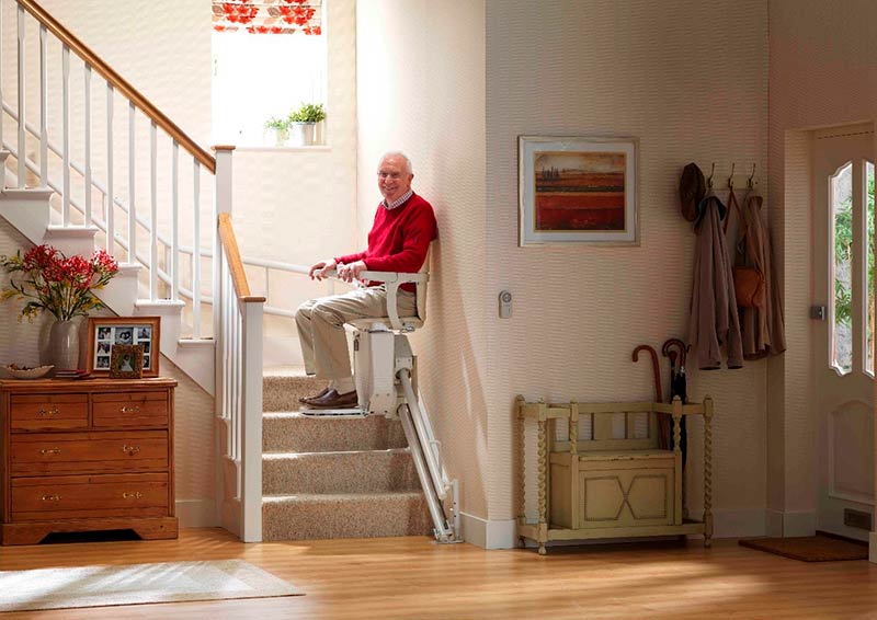 Man seated on Stairlift
