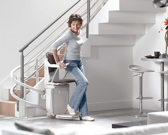 sitting down on a stairlift