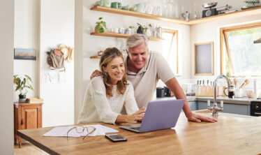 Couple looking at budget and homelift alternatives